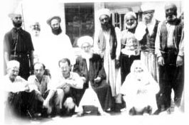 Shaykh Abdullah ad-Dagehestaniwith murids in Damascus. Shaykh Nazim is to the right of Grandshaykh and Shaykh Hussein is to his left.
